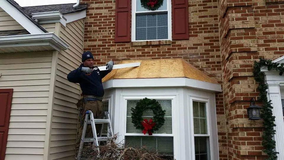 Rebuilding the small roof over a bay window on a brick home
