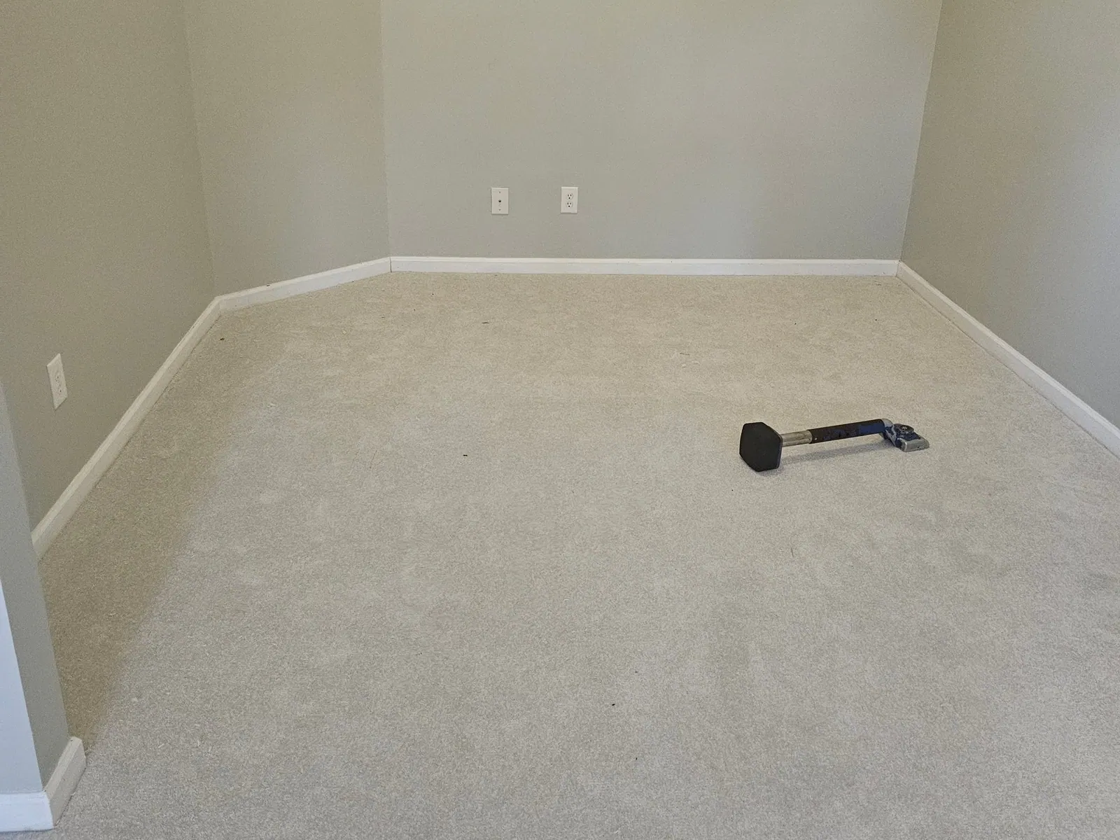 New carpet installed in an empty bedroom